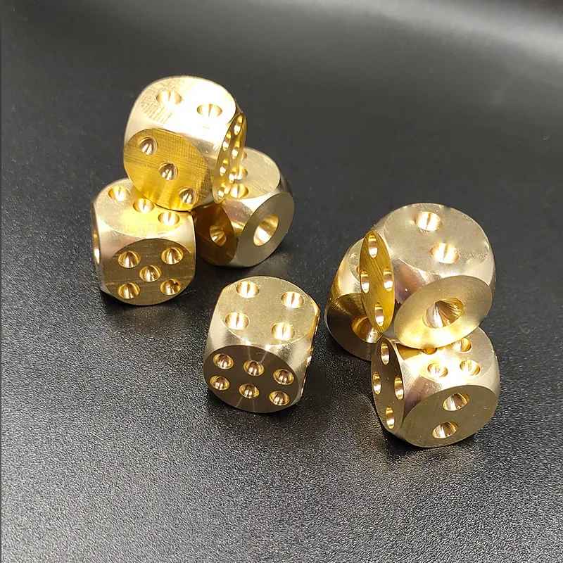 Brass dice stonewash finish detail showing natural patina development