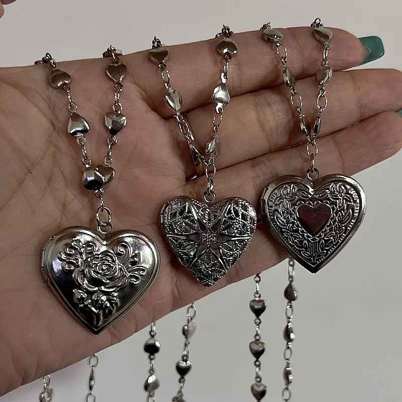 Heart locket photo necklace open showing photo compartment