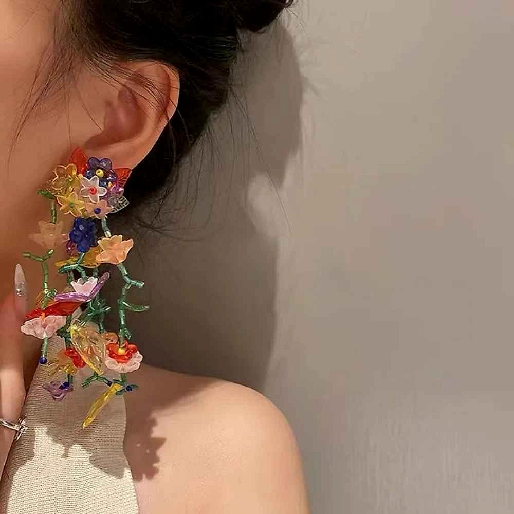 Handcrafted bohemian beaded tassel earrings with vintage-style crystal accents, close-up detail view | BigMoetsy
