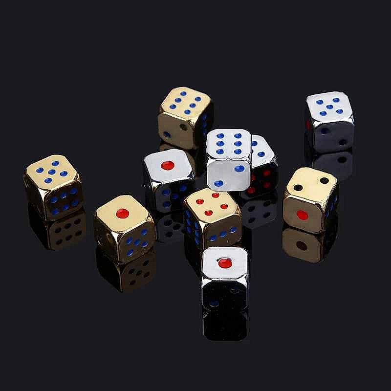 Metal polyhedral dice set showing gold finish with colorful pip inlays