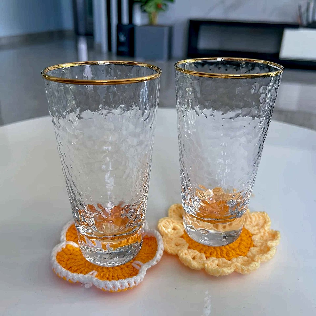 Handmade crochet sunflower coaster in yellow and brown tones, textured floral detail, perfect for mugs | BigMoetsy