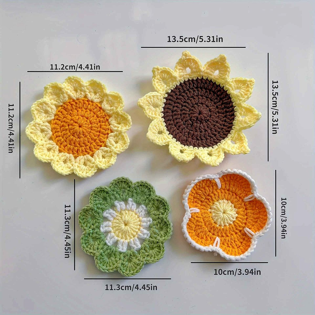 Handmade crochet sunflower coaster in yellow and brown, close-up detail view showing textured petals | BigMoetsy