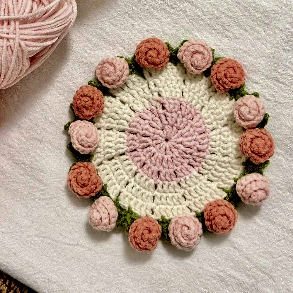 Handmade crochet sunflower coaster in yellow and brown, textured floral detail, protecting surface from mugs | BigMoetsy