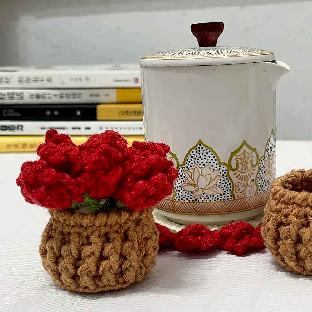 Handmade crochet sunflower coaster in yellow and brown tones, textured floral detail, protecting surface from mugs | BigMoets